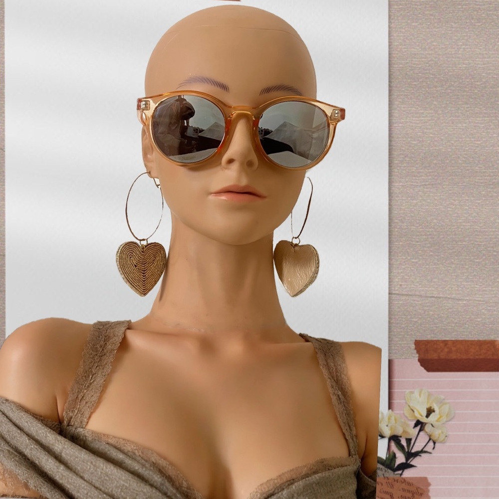 Anthropologie’s Gold Oversized Round Sunglasses with Mirrored Lenses